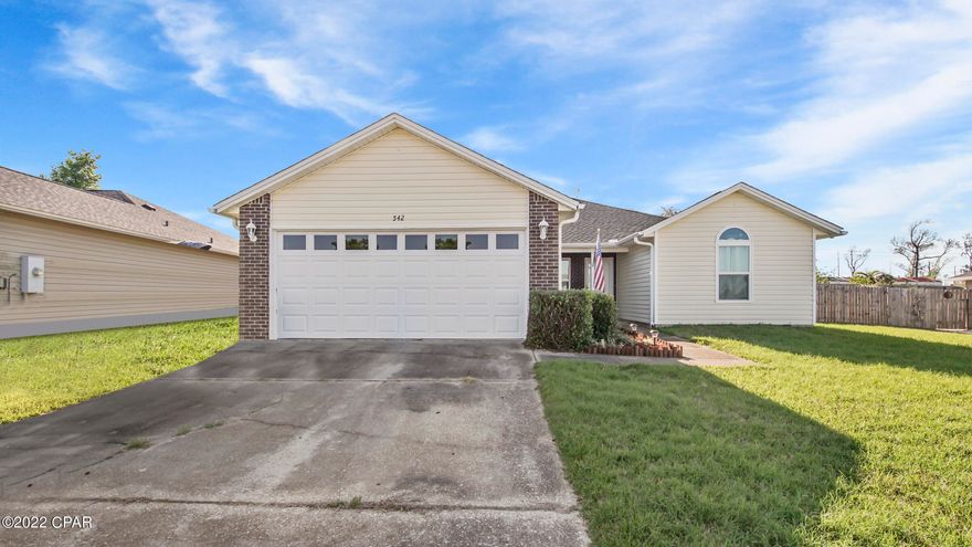 This split-bedroom design has three bedrooms and two baths. As you enter the home there's a spacious family room with a vaulted ceiling. The eat-in kitchen has lots of natural light, breakfast bar, pantry and all appliances. The owners suite has two closets and an en suite with a double vanity and a separate toilet/shower area. Off the kitchen is a relaxing screened porch and a large back yard that's fully fenced with a storage shed with electricity. There is also a two-car garage and sprinkler system on a separate well.