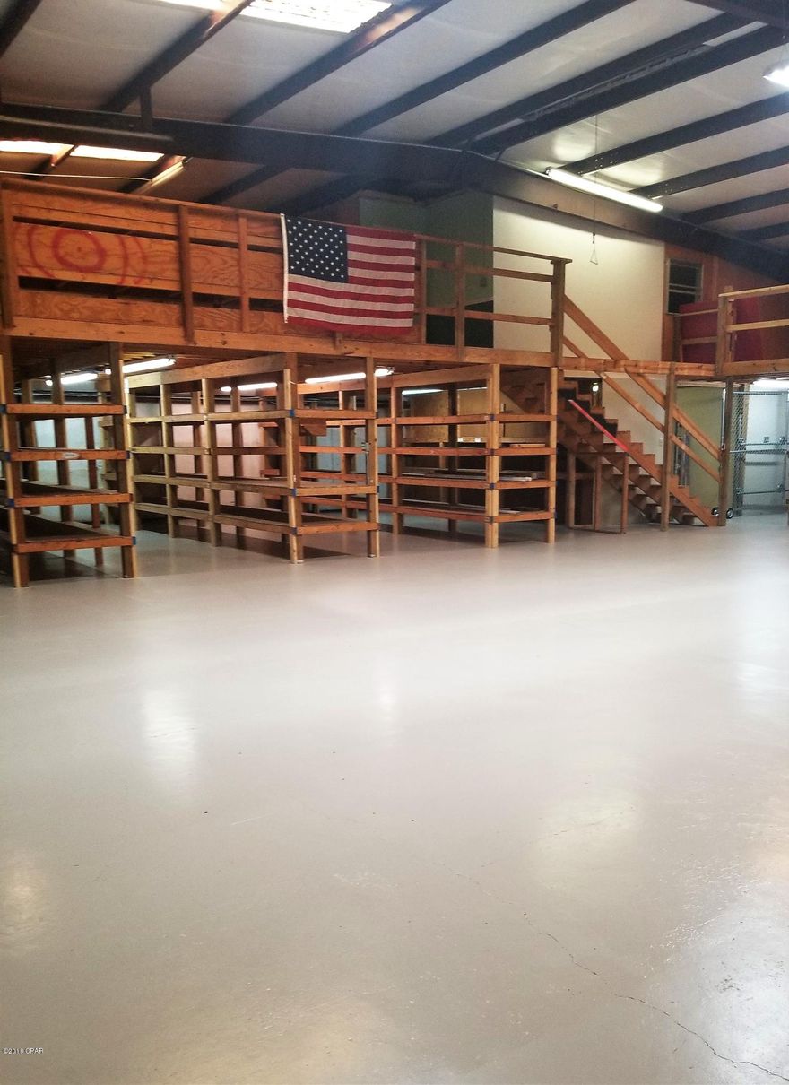 2 Story, 5000 SF Climate Controlled with (2)5 ton A/C'S for Warehouse and 2.5 ton HVAC for 1300 build out administrative space on 1st floor, plus 2 offices and large conference room on 2nd floor.  Located in the desirable Holley Industrial Park,this is an ideal location for a Military Contractor, Wholesale Distributor and a variety of other business pursuits. Clear ceiling height is 16 FT and there are (2) 14 x 14 Bay Doors with double driveway and epoxy floors to assist with the delivery of large equipment. The facility is also equipped with high-intensity,low-cost LED technical lighting, high speed wireless internet,telephone lines and paging system Security includes HD Cameras,monitor & digital video recorder. Behind warehouse there is also a 25 x 80 foot fenced in lay down yard.