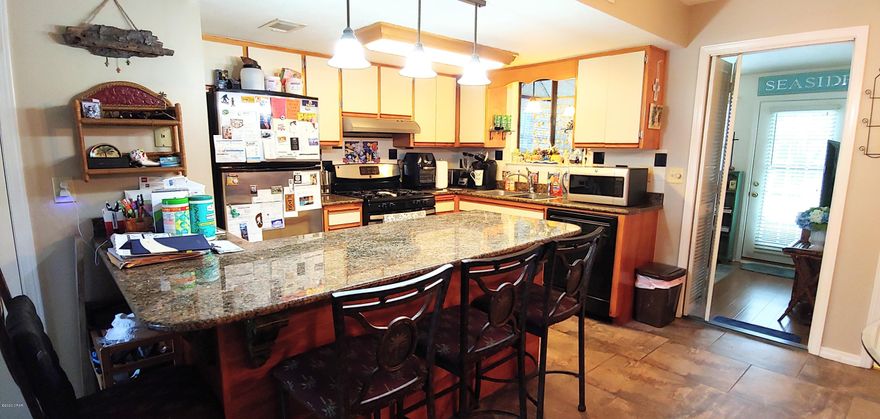 Here is an END UNIT backing up to the MINI GOLF COURSE. and 1 of the 11 POOLS. This unit has a ''Private Oasis'' out back. Come check out this 2 BR with 2.5 Baths in the Gated Resort of Gulf Highlands Beach Resort. Please excuse the pictures, the Seller is packing. Age, SF, and dimensions are approximate... please verify if important.