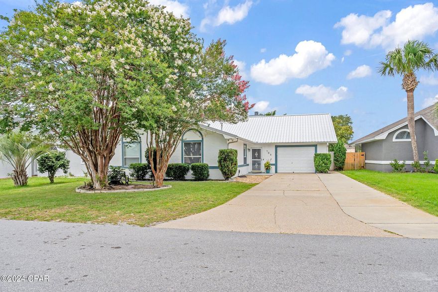 CURRENTLY UNDER CONTRACT WITH A KICK OUT CLAUSE, SELLER WILL CONSIDER BACK UP OFFERS.  Welcome to your coastal oasis found in part of the exclusive Bid A Wee Beach community with private beach access!  This fully renovated 3-bedroom, 2-bathroom single-family home offers the epitome of coastal elegance.  Enjoy the serenity of a fully fenced yard, relax in the outdoor hot tub or beneath the hot water outdoor shower, and soak in the coastal vibe on your spacious 12x50 covered back porch.

This residence features granite countertops, tiled walk-in showers, 10 ft ceilings, and crown molding in select areas, adding a touch of elegance.  Gas hot water heater was installed in 2016, completely new HVAC system (inside and outside) & roof was installed in 2019, and a full renovation to include all flooring, tile showers, all light fixtures throughout the home, bathroom vanities, gas stove, refrigerator & even HVAC duct work was installed in 2021. Full exterior paint with elastomeric paint was completed in 2023.     All you need to do is unpack and move in.  

With an oversized single car garage and an extended driveway for multiple vehicles, parking is a breeze. Located in a highly desirable school district, this home provides the perfect combination of convenience and beach living. Don't miss the chance to call this slice of paradise your own - schedule your showing today!