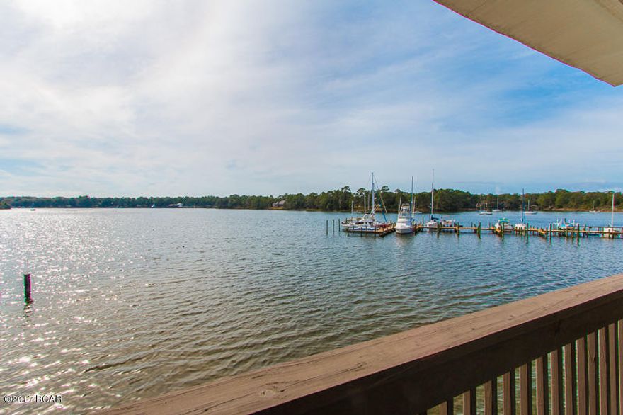 By far the best priced unit on all of Watson Bayou! With amazing views, plus direct access to the bay, this unit will sell fast!! This is your opportunity to own a waterfront property with no hassle of landscaping and upkeep! This amazing waterfront unit in Bayou Pointe is in great shape and absolutely move in ready! This complex is centrally located in Panama City, and less than 15 minutes to Panama City Beach. This is the ideal spot for boating and fishing, so hurry and make this unit yours before time runs out! At this price it won't last long on the market.