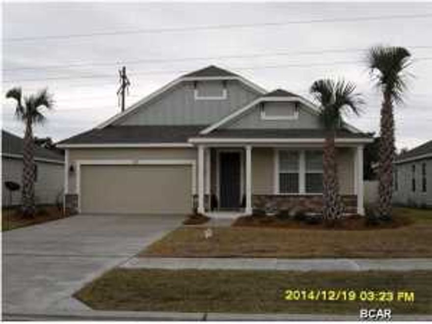 Beautiful new construction home in the new Whisper Dunes Phase 2A Subdivision. The home has a Cobia floor plan with a Coastal Elevation. A Samuel Taylor built home includes standard features such as designer carpet in main areas and bedrooms, 8 ft. 2 panel craftsman interior door package, brushed nickel fixtures and faucets throughout, insulated (R19) interior common walls and insulated (R38) ceilings, and durable Sherwin Williams premium interior wall paint. Kitchen features stainless steel appliance package (range, dishwasher, & microwave) and oversized 36'' wood cabinetry with crown molding, and granite counter tops. Full bathrooms include raised vanity heights, large tile flooring in bathrooms and laundry rooms, 2 x 6 Exterior Wall Construction, and hurricane tie down rod