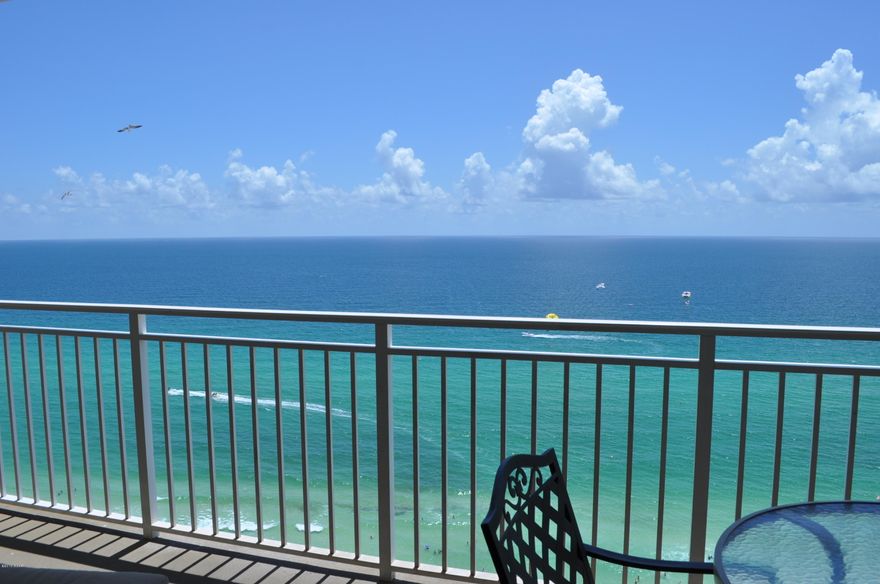 Beautifully furnished, rental ready unit with very successful rental history in Emerald Beach Resort. You'll experience the most beautiful sunsets from the privacy of your 22nd floor balcony.  This is a 1BR/1BA with a bunk unit and features include all ceramic tile flooring, granite countertops, GE High Profile appliances, stackable washer/dryer, and designer quality furnishings.  Seller has added all new furnishings, interior paint and new tile flooring in the last two years.  Emerald Beach Resort is an all inclusive complex with 5 swimming pools, (2 beachside), 2 hot tubs, 2 tiki bars, a Starbucks in the lobby, large fitness center, high speed elevators, escalators, and the Sky Bar & Grill located within the Front Beach walkover.  You also have hundreds of feet of dedicated beach! You're centrally located, convenient to lots of family-oriented amenities andjust a five minutes drive to Pier Park!   All info is approx. and must be verified by Buyers if important.