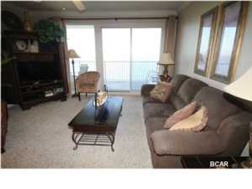 This complex is oriented so that it gives perhaps the best view of the beach in Panama City Beach. The master bedroom, living and dinning areas have beautiful Gulf Front views. The unit features ceramic tile in the foyer, kitchen and bathroom areas along with plush carpet in the living and bedroom areas. The kitchen has granite countertops and GE appliances. The bathrooms are spacious and have marble countertops. The complex has a large heated pool and two gazebos, covered parking, four high-speed elevators, fitness room, owner's lounge and game room. From the large Gulf Front balcony you have a great view of the west beach and the east beach including the pristine St Andrews State Park. You can watch the ships as they come through the pass. All information and measurements are