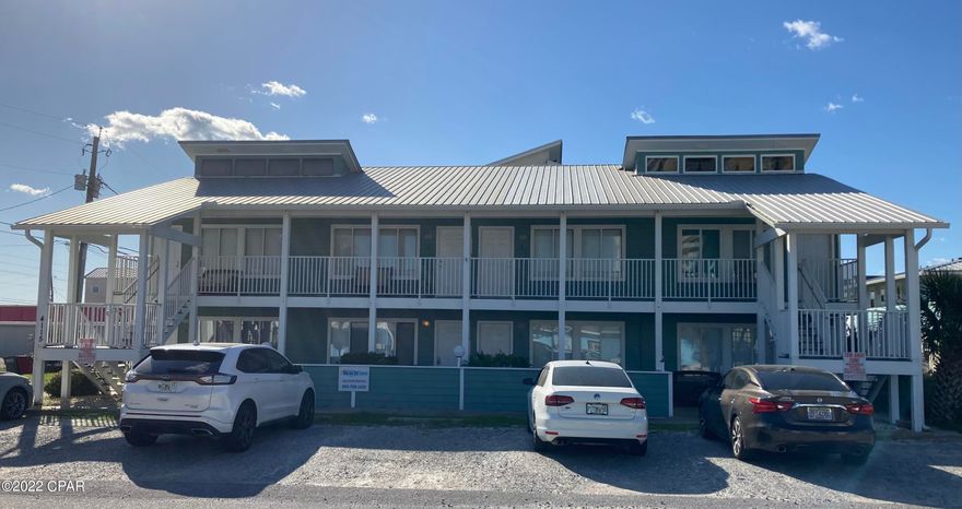 ***Updated 1bd(w/loft), 1ba 2nd floor fully furnished corner unit with a great gulf view. This lovely 8 unit complex is less than 1 block from the beach*** Updates include tile and vinyl plank flooring, fixtures, appliances, and lighting. Main bedroom is very spacious and has an extra large closet that accommodates the stackable washer and dryer. The loft area has been set up as the perfect 2nd bedroom and has been partially enclosed for more privacy. 2016(ish?) A/C and 2018 roof replaced after Hurricane Michael. This complex is located minutes from the state park, restaurants, shopping, and about 15 minutes from Pier Park. Hurry before this beauty gets away! All info is approximate and should be verified by buyers if important.