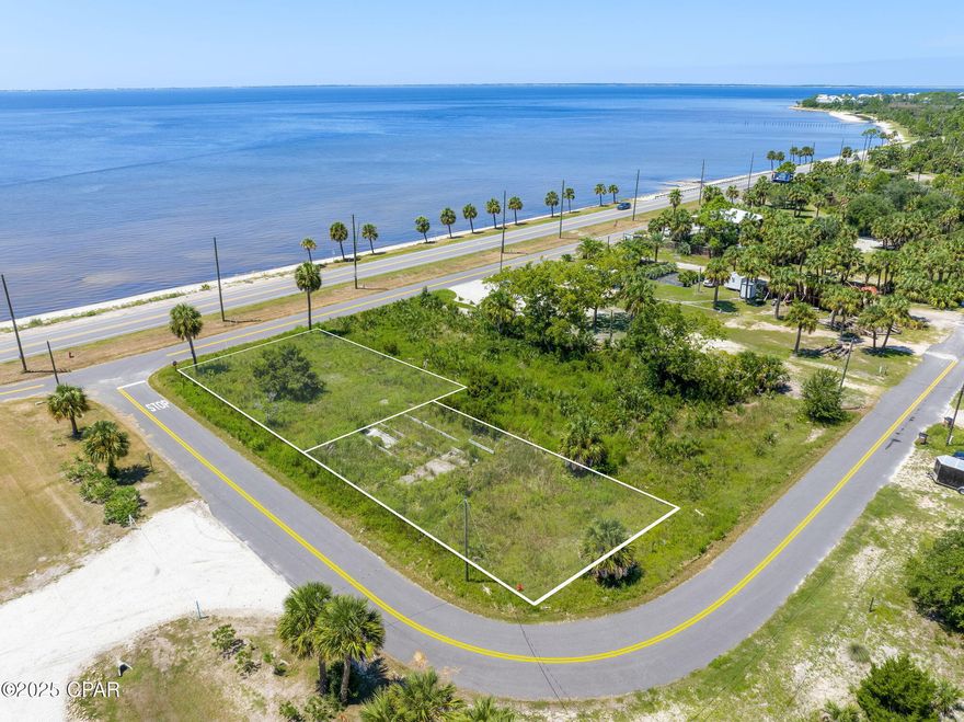 Discover the potential of this versatile property located in the heart of Port St. Joe, directly across the street from St. Joe Bay. This is currently one parcel with the flexibility of being able to divide the parcel into two lots. Whether you're seeking an RV site, investment opportunity, or the perfect spot to build your coastal retreat, this parcel delivers. Property Highlights: Zoning Flexibility - Up to 2 habitable dwellings per parcel (or 1 dwelling if left undivided), RV friendly - 1 RV allowed per parcel, Set. Setbacks: Structures under 25' - 7'6'' setback, Structures over 25' - 9'6'' setback. Flood Zone AE10; This property is situated in a peaceful coastal neighborhood with convenient access to nearby beaches, boat launches, and the charm of downtown Port St. Joe. With room to design your dream home-or even multiple dwellings-this lot provides incredible flexibility for personal use or investment. Build your future along Florida's Forgotten Coast. *All measurements and information approximate, please verify if important.