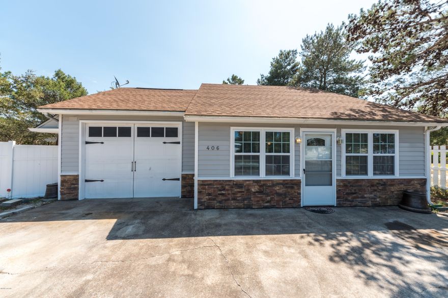 Photos coming on Tuesday 3/21/17...Recently remodeled, this 3 bedroom 1.5 bathroom  is located on a huge corner lot off North Lagoon and  is move in ready! First floor Master bedroom features trey ceiling and separate back entrance. Kitchen has been updated. The home is light filled and boasts much storage and laminate flooring. Back deck recently added also has an exterior shower area. This enormous lot is also perfect to put your boat or RV with 100' gravel drive within fenced area, and 200 amp upgrade in 2015 plus an 8x8 shed. Great location near to beaches, and a tree filled yard creating privacy, makes this property a deal!  It won't last long.  Make your appointment today!