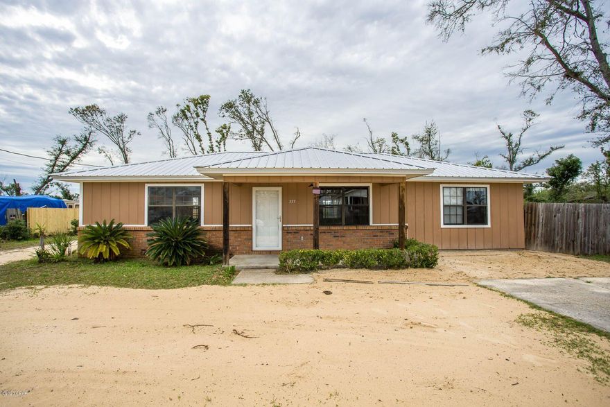 CURRENTLY UNDER CONTRACT, SELLER ACCEPTING BACKUP OFFERS. Charming 3 bedroom/2 bath home is situated on almost a half acre lot! There is an additional driveway on the side of the home to pull in your boat and RV!  As soon as you step through the front door, you will notice the cathedral ceilings that give the home the feeling of space and expansiveness. The open kitchen boasts stainless steel appliances. All of the bedrooms are very spacious. Huge master bedroom has a walk in closet and private bathroom, with stand up shower. Flood Zone X, so flood insurance is NOT required. There's so much to love about this home! Call today! All measurement's are approximate, please verify if important.