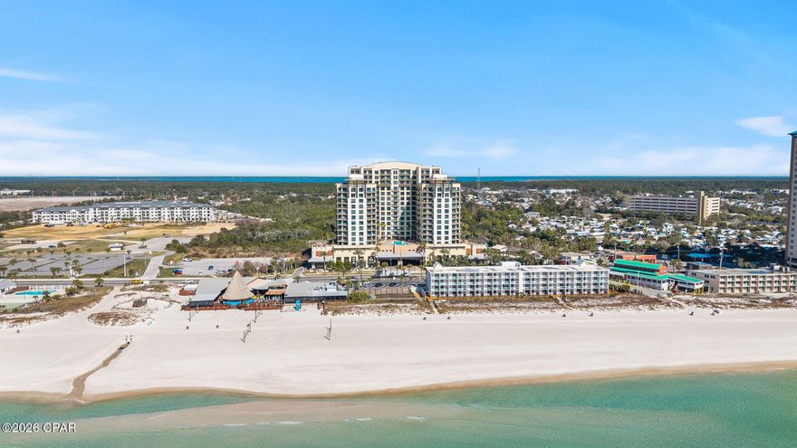 Experience the ultimate Panama City Beach lifestyle in this stunning 16th-floor penthouse condo. Unit 1604 offers a rare private rooftop balcony with sweeping 180-degree views of the Gulf, Pier Park, and West Bay; perfect for sunrise, sunset, and front-row seats to multiple fireworks shows.

Step inside to find breathtaking Gulf views through the wall of windows in the living room and kitchen. The split floor plan features two primary suites with en-suite baths and walk-in closets, plus a third guest bedroom with a full bath just across the hallway. The spacious living and dining areas provide plenty of room for entertaining, while the modern kitchen boasts new appliances, a large island with seating for three, and a dining table for six. Enjoy solid-surface flooring throughout (no carpet) along with updated lighting, ceiling fans, fresh paint, new décor, and new flat-panel TVs. Weatherproof composite patio furniture enhances the outdoor experience.

Step out onto one balcony off the living room or the larger shared balcony connecting one primary suite and the guest bedroom. From here, access your expansive private rooftop terrace, an incredibly rare feature in PCB with uninterrupted Gulf views.

This unit is fully furnished and short-term rental ready. It can also be purchased with Unit 1602 as a combined lockout property (Contact listing agent for more details). 

Origin at Seahaven offers numerous amenities, including a heated pool and hot tub, two BBQ and picnic areas, a theater and game room, laundry facilities and vending, and a gated community with 24-hour security. On-site retail includes Starbucks, a convenience store and grill, and the Sunsations beach shop.

This is a must-see property for anyone seeking luxury, breathtaking views, and a true Panama City Beach lifestyle. Schedule your viewing today!