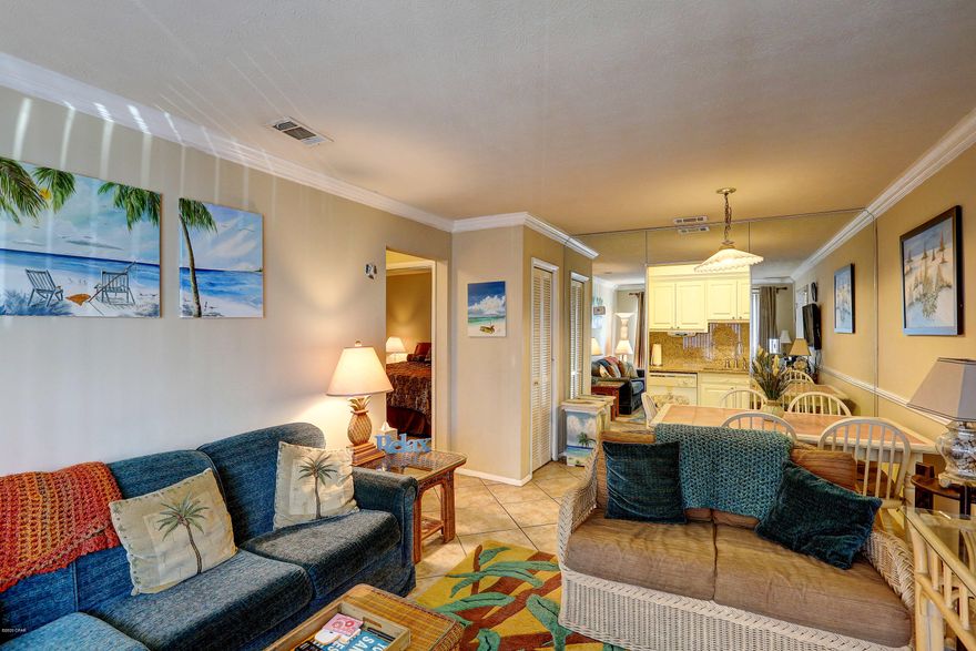 Beautiful 2BR/1BA condo, ground floor, across the street from the beach.  Perfect for second home or vacation rental/income property.  Beach access across the street, can be seen from unit! Less than 3 minute walk to beach from front door.  Five minute drive to Pier Park, plus quick access to Back Beach.  Amenities include pools, hot tub, shuffleboard, exercise room, BBQ grills, and on site laundry. This unit is bargain priced and is a must see!