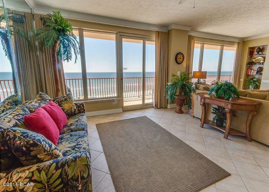 This Glorious 2328 Sq.Ft. 3 Bedroom 3 Bath condo is located in the upscale luxury resort of Hidden Dunes. With a Grand Entrance, Formal Dining, Oversized kitchen with Breakfast Bar, Giant Living Room and Spacious Balcony for enjoying the unmatched sunsets over the pristine waters of the Gulf of Mexico. One of the finest units in one of the finest buildings in all of Panama City Beach! Hidden Dunes is recognized as the only complete luxury condominium resort located in Panama City Beach, Florida. Accommodations include our 2300 square foot, with a private balcony overlooking the Gulf. Amenities include one large swimming pool, a kiddie pool, game room and vending area. Also available for your enjoyment, we have an exercise room.

Our Extra Large Master Bedroom has a king-size bed with a 36 inch TV, VCR, and DVD The adjoining master bath has a Jacuzzi, jetted tub, large separate shower, huge walk-in closet, and the perfect panoramic view of the ocean. From the master bedroom, double glass doors open onto the balcony for the sound of waves and moonlight!

From the moment you enter you will love the view and the wide open space, all 2300 square foot for your family to enjoy! Relax and watch the amazing sunsets. This condo is located on the 6th floor directly overlooking the pool area.

Enjoy cooking meals for your family in a fully equipped kitchen with microwave, convection oven, dishwasher, side by side refrigerator with ice maker, garbage disposal, and custom made cabinets with Corian counter tops and ceramic tile floor. Enjoy meals in the Formal Dining Room. The laundry room is furnished with full-size washer, dryer and laundry sink. Your vacation home has digital air and heat, intercom system, separate hot water for the kitchen and baths.

Second master bedroom is furnished with king-size bed, large TV, VCR, DVD and private bath. The third bedroom has two twin-size beds, TV with VCR, DVD and private bath. The carpeted, spacious GREAT ROOM has a big screen TV, VCR, DVD, stereo, CD and tape player, and provides two additional queen size sleeper sofas.

The extra large third bedroom has two twin size beds. Perfect for children.

From the Great Room step outside onto the Huge Balcony where you will find a table and chairs with ample additional seating which directly overlooks the pool and the emerald clear waters of the Gulf of Mexico.

This beautiful Million Dollar condo is an example of Florida's BEST! Amenities will far exceed your expectations. Additional Parking is available on the upper deck.

Age, dimensions and square footage are approximate.  Buyer should verify if important.