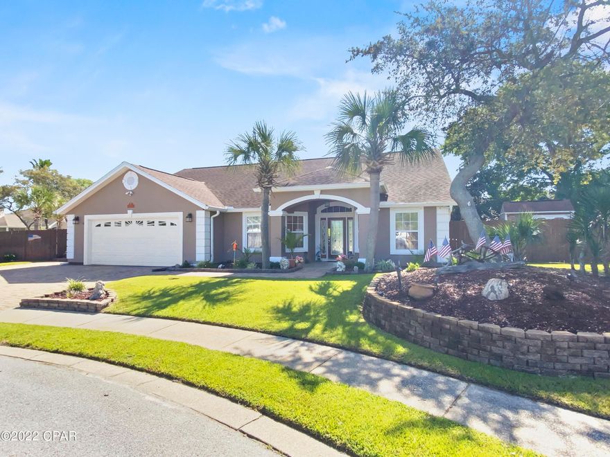 CURRENTLY UNDER CONTRACT, SELLER WILL CONSIDER BACKUP OFFERS - This home is located in the very desirable Summer Breeze neighborhood. Located on the west end of Panama City Beach, Summer Breeze is walking distance to the beach and close to shopping at Pier Park and lots of restaurants. This beautiful 3 bedroom 2 bath home is on a quiet cul-de-sac and has extra room for parking. The large outdoor living space with the beautiful pool is great for entertaining or just relaxing in your back yard. All the bedrooms are spacious and the master bath features a separate tub and shower, walk-in closet and double vanity. The open floorplan and large rooms are bonus for this home. The utility/laundry room is also a storm shelter with concrete walls and concrete ceiling.