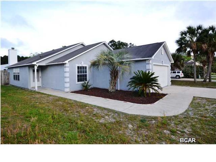 Absolutely gorgeous 3B/2Ba home in desirable subdivision in the Breakfast Point school area. This freshly painted split bedroom floor plan home with an open feel has a great room with gas fireplace, sliding doors from the dining area to the rear yard with screened porch. The spacious master bedroom has a walk-in closet and updated bathroom with clean modern lines. Privacy fenced yard with at the front of the home a driveway boasting room for a boat and 4 to 5 cars. Please verify all information if important to you.