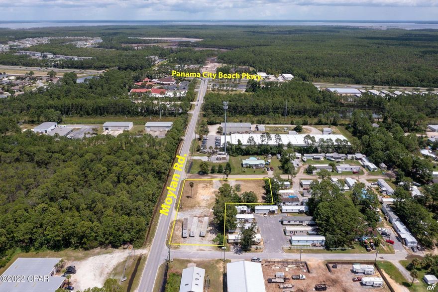 Nice level land ready for your new business. So many options with the C3 zoning. With C-3 commercial zoning already in place, the land has all utilities available and was already cleared and site ready. The owner had a business located here previously. It is located at the fast growing east end of Panama City Beach and within walking distance of Panama City Beach Parkway as well as the nearby street access from Front Beach Rd. Previous owner had one of their landscape locations at the property site. Fantastic business location for commercial warehouses or other industrial type businesses or office buildings etc. Don't miss this great opportunity!!!! Multi units also allowed.