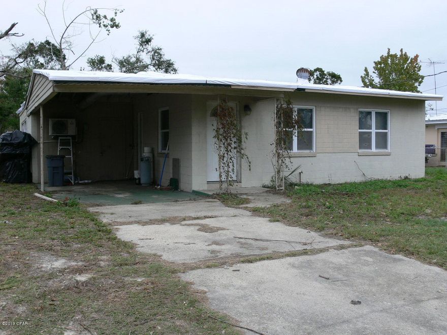 INVESTMENT PROPERTY! Would make a great starter home or rental. Home was severely damaged from Hurricane Michael and needs total remodel to bring it back to it's full potential, interior has already been removed just ready to start construction. Great central location and only 14 minutes to Panama City Beach. Square foot is not exact buyer should verify.