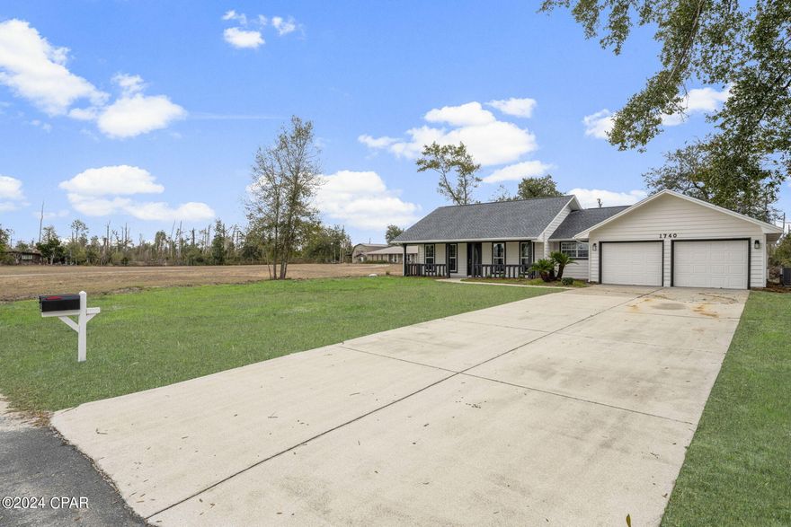 BEAUTIFULLY RENOVATED HOME in sought after neighborhood in Lynn Haven! The stunning white kitchen has new stainless steel appliances. Open concept kitchen, dining and living room. Split bedroom floor plan. This home as brand new flooring, bathroom tiling, vanities, mirrors, fixtures, toilets and ceiling fans. This home also features a huge 2 car garage. The backyard is cleared and private. Backyard has plenty of space for a dream pool. Property is high, flat and dry perfect for pets and kids. NEW 2023 roof, AC and hot water heater! This home is minutes from a boat ramp and has plenty of space to park your boat! Don't miss your opportunity to own this beautiful home in the heart of Lynn Haven.