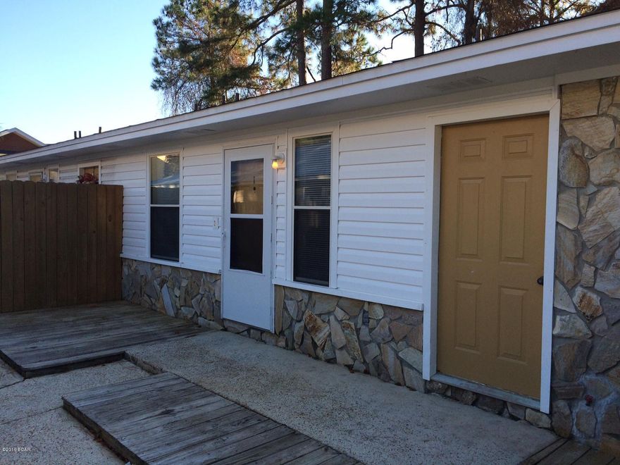 Just a short walk to the beach - this is a 2 bedroom 1 bath tri plex unit located in the Thomas Drive area. This unit features all tile floors, breakfast bar area, and separate laundry room.