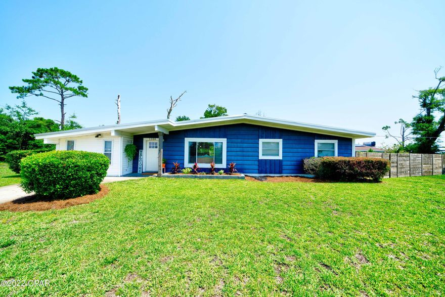 CURRENTLY UNDER CONTRACT, SELLER WILL CONSIDER BACKUP OFFERS Centrally located 4 bedroom, 2 bath home with a large sunroom, boasting beautiful upgrades throughout. The solar panels will be paid off at closing, providing a huge discount to the buyer! This home sits on an oversized corner lot in the desirable Forest Park neighborhood. This home will wow you with its modern touches. Perfect for entertaining! Upgrades include new flooring, paint, modern lighting and a covered deck. The living room is spacious with a beautiful, whitewashed brick wall and gas furnace. The dining area features a custom built-in bench and table that opens up to the large, updated kitchen. The kitchen is equipped with quartz counters and stainless appliances including an electric stovetop, tile backsplash, updated cabinets, a pantry and a breakfast bar. The kitchen leads to the large sunroom boasting a plethora of windows to allow plenty of natural lighting to illuminate the space as well as recessed lighting and sliding glass doors that lead to the covered deck and spacious backyard. The laundry room is also located in the sunroom. The primary bedroom features beautiful lighting, a mirrored closet and a private en suite. The private primary bathroom features a shower/tub combo with surround subway tiling.  The three additional bedrooms share a full bathroom also featuring a surround tile shower/tub combo. The large fourth bedroom is located off the living room and features double closets as well as an additional closet space and a barn door that opens up to the laundry room. The huge backyard is perfect for hosting family and friends with a covered deck featuring a swing and an outdoor dining area as well as a fire pit and two sheds. This home also features beautiful landscaping and new irrigation with a well. This home is located just off 23rd St and is near many restaurants, grocery stores, schools, parks and more!  Please note: no roof permit on file. Seller has 4pt and wind mit to provide to new buyer. NO VA or FHA.