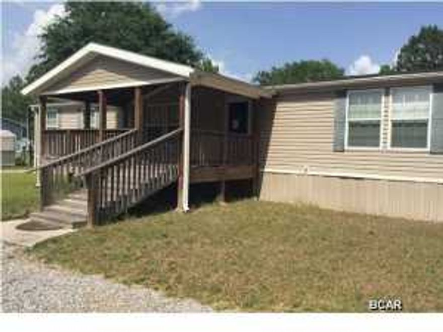 This is a very spacious home on a huge lot. Enjoy the outdoors on 2 large covered porches, front and back. The living room has a corner fireplace. The very large kitchen has a center island, lots of cabinets and counter top space. The master suite has a very large walk in closet with built in shelves and drawers. The master bath has a double vanity, garden tub and separate shower. The spacious laundry room provides extra storage space with built in cabinets. The home also has an oversized detached garage with a large workshop with power.