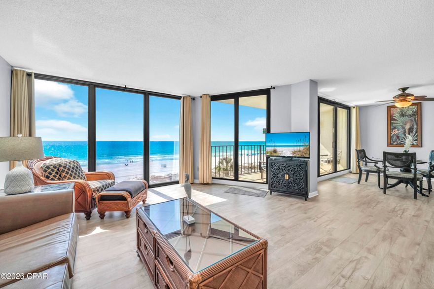 Welcome to Edgewater excellence in Tower II-307, featuring the coveted 'Deluxe' floor plan that delivers the resort's most spacious 2-bedroom design plus massive rental opportunity. This well-maintained third-floor retreat is sold fully-furnished and features several high-value updates, including a 2021 HVAC system and newer hurricane-rated floor-to-ceiling sliding glass doors for seamless balcony access. The kitchen is equipped with stainless steel appliances and painted white cabinets. Throughout the unit is upgraded wood-look flooring and tile (no carpet!). The dining room flows to the large balcony which provides spectacular, direct views of the emerald waters and white sands from a vantage point that feels remarkably connected to the beauty of the Gulf. 

Since it is already on a rental program, a new buyer has the opportunity to begin collecting rental income immediately. Comparable 2-bedroom units at Edgewater are generating $50,000-$60,000 annually! Now is the perfect time for a new buyer to add their own personal flair and coastal vision to capitalize on rental potential. Tower II is an ideal location, situated west of the grand lagoon pool and closer to the beach than Tower I for added privacy and easier shoreline access. 

Edgewater Beach and Golf Resort remains a landmark destination in Panama City Beach, offering an array of amenities that no other complex can match. The HOA is in a strong position with all required inspections completed and no special assessments pending. Edgewater offers direct beachfront access and a wealth of on-site conveniences including a beachfront restaurant, market, pizza, and ice cream shop. Stay active at the large fitness center, pickleball and tennis courts, or the golf course located right on the property. The guarded security gates and proximity to a plethora of local dining and attractions make this one of the most sought-after locations on the Emerald Coast. Whether you are looking for a beach home or a strategic investment, this unit offers a solid foundation at an incredible value. Schedule your showing today to experience the amazing Gulf views and the endless possibilities of this Tower II Deluxe oasis. A video tour is also available