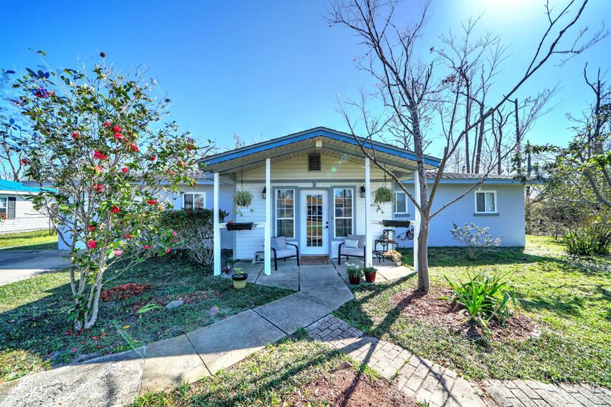 ***MUST SEE MOVE IN READY HOME***

This Lynn Haven Home is boasting with extras, it's too much to list. There is plenty of space with over 2100 sq. ft. 3 bedrooms and 2 bathrooms.  The large open Kitchen has stainless steel appliances and flows into the dining area. The added on Family room is large with plenty of light from the doors which lead out into the back yard. The attached Garage was converted into a great laundry room with additional space for a play area, home office, or exercise equipment. There is lots of storage throughout the home. Closets and built in display shelves will allow you to organize like an HGTV star. The back yard has a large Workshop on slab with electricity. The home was freshly painted and ready for you to move in.