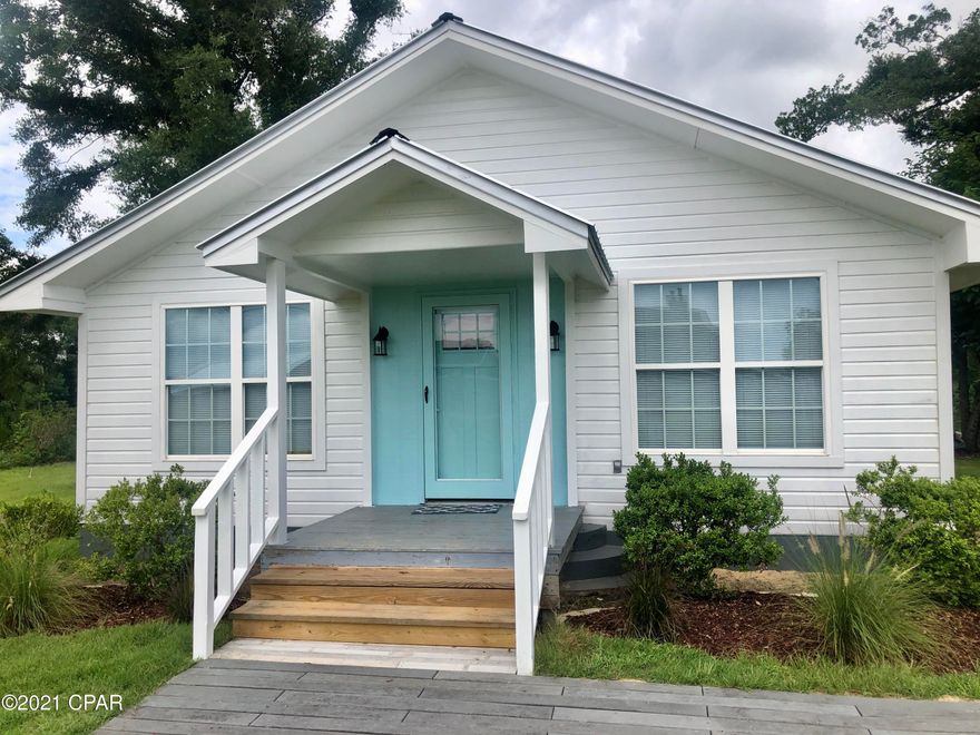 CURRENTLY UNDER CONTRACT, SELLER ACCEPTING BACKUP OFFERS  101 yrs young is this 3/2 across the street from beautiful Compass lake.  Situated between both public boat landing is this newly remodeled home which includes: new metal roof, kitchen cabinets, new Sheetrock, New ceiling fans, fixtures and more, some original hard wood floors that are beautiful. Side deck for morning coffee with a view of the lake, inside laundry room and more. Only 35 min drive to 23rd street in Panama City Fl.  Close to the beaches. Excellent fishing, swimming and more at the lake.