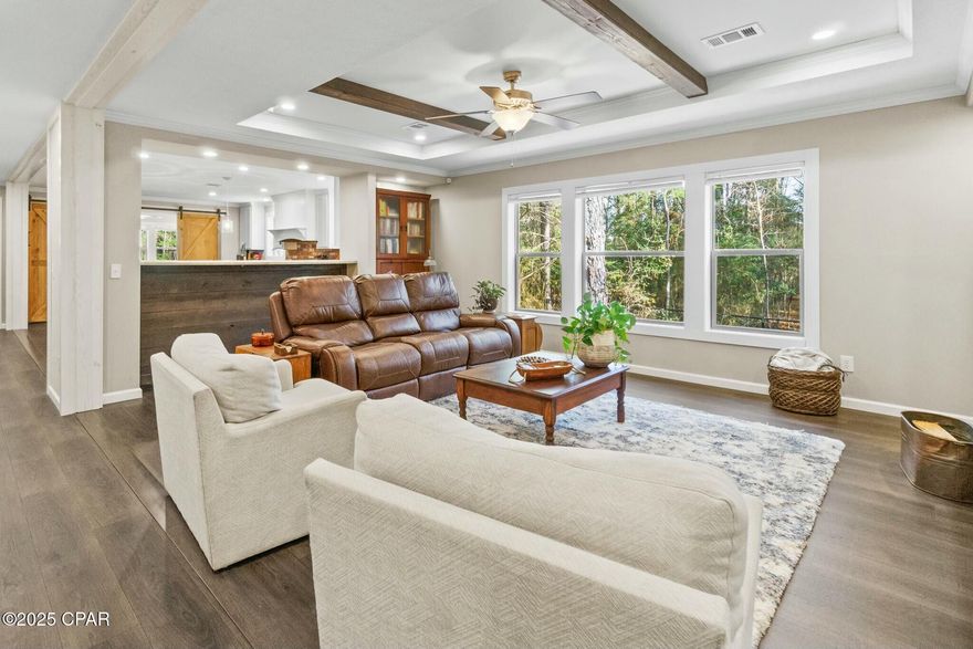 Secluded Countryside Retreat on 7.3 Acres in North Holmes County!

Nestled in the heart of North Holmes County, this stunning 4-bedroom, 2-bathroom home is a rare gem for those seeking peace, privacy, and natural beauty. Set on 7.3 wooded acres, this property offers the perfect blend of modern comfort and serene country living. As you arrive, you'll appreciate the convenience of a paved road leading directly to your gated property, ensuring smooth access year-round. 

Step inside this tastefully designed home to a warm and inviting living space, where large windows fill the space with natural light. Timeless built-in shelving adds charm to the living area, while the spacious kitchen is a dream for cooking and gathering, offering ample counter and cupboard space. 

A versatile flex space offers endless possibilities—whether you need a cozy den, a home office, or an additional bedroom, this space adapts to your needs.
Outside, this exceptional property contains a brand-new well, septic system, and storage shed for added convenience and value. A small fenced yard provides a safe haven for pets, while the surrounding 7.3 wooded acres offer a private, serene escape. Enjoy frequent visits from deer, rabbits, and a variety of birds, bringing the beauty of nature right to your doorstep.

Situated just 7 miles from Interstate 10, this property offers the perfect blend of peaceful country living with easy access to key destinations. Enjoy being just 50 miles from the stunning Emerald Coast beaches and ECP Airport, 30 miles from Dothan, 65 miles from Tyndall AFB, and 75 miles from the Eglin AFB area. You won't find a better location for countryside living with city conveniences nearby! 

Whether you're looking for a peaceful retreat or a forever home, this tranquil countryside oasis is ready to welcome you. Don't miss your chance to own this one—schedule your private tour today!