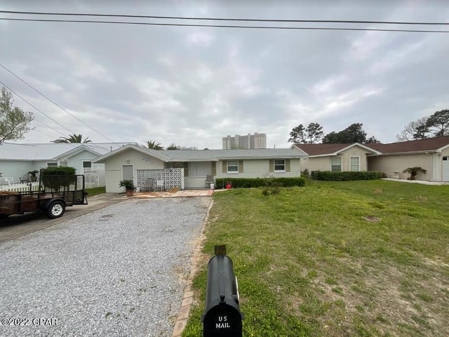 Location, Location, Location!! 1986 total sq/ft divided into a 3/1 & a studio with bath and laundry. This property needs updating but holds tremendous opportunity!! Come paint the picture of your new long term rental, second home or retirement home!! Currently renting for $3700 a month!! Just blocks from one of the worlds most beautiful beaches! This will not last!!