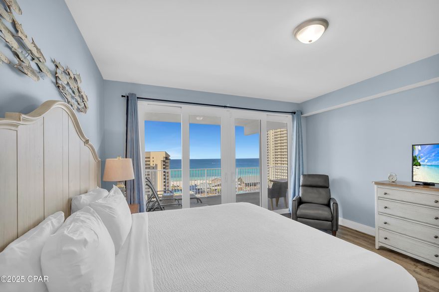 SEE THE SEA. ENJOY THE SPACE. EMBRACE THE RESORT LIFESTYLE.  
From the 9th floor of Laketown Wharf, this 3-bedroom, 3-bathroom condo with a bunk area delivers views, comfort, and convenience in one of Panama City Beach's most popular resorts. With 1,681 square feet, this tastefully decorated condo is being offered fully furnished, featuring LVP flooring throughout, king-sized beds in all three bedrooms, stainless steel appliances, flat screen TVs, and a washer and dryer. The spacious balcony sets the stage for unforgettable sunsets over the Gulf.  Laketown Wharf is known for its unmatched amenities. Residents and guests enjoy five pools, including one heated year-round, two hot tubs, a fitness center overlooking the Gulf, a kids' playground, pickleball, and even mini golf. The 52,000 square-foot boardwalk circles the lake with a nightly fountain and light show. Direct, gated beach access sits right next door to Pineapple Willy's.  On the ground level, you'll find a lineup of restaurants, shops, and entertainment: Juan Taco, Wharf Seafood Buffet, The Candymaker Ice Cream Shop, PCB Pizza, In Cahoots for breakfast and brunch, The Press coffee shop, The Bun Lab, and more. The property also offers 810 Billiards & Bowling, a salon and nail bar, barbecue and pet areas, a poolside Splash Bar & Grill, two parking garages, and beach chair rentals. HOA dues include water, sewer, trash, cable/TV, pest control, WiFi, and full use of amenities.  Nearby attractions continue to grow, with Dolly Parton's Pirate Theater and Topgolf now open in Panama City Beach. Whether you're looking for a vacation home, income-producing rental, or a place to enjoy the coastal lifestyle full-time, Laketown Wharf 921 is an opportunity worth seeing.  All information is deemed reliable but should be verified by the buyer if important.