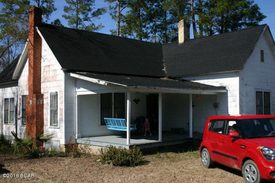 Great old Southern charmer located in Chipley. This 2 bedroom 1 bath home has made a lot of memories for the family and now it is time for new memories to be created. Home is conveniently located to downtown Chipley. This would be a great renovation project to restore the home to it's glory years. Underneath the carpeting is the original hardwood flooring. Large front porch to enjoy the afternoons and relax with a cool Iced Tea. Side of the home features a good sized screened room. The lot is 6/10 Tenths of an acre and has a storage building. Perfect starter home or for some one looking to down size.