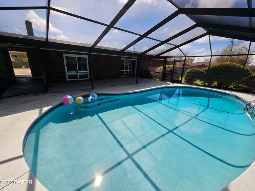 One acre on large corner lot with enclosed swimming pool. Looking for a large house with lots of room and land, this is it. This house offers 3 bedrooms 2 bath with large kitchen and dining area. Family and living rooms with fireplace overlooking the swimming pool. Lot has lots of room for all your toys and includes a yard building and fire pit. Master bedroom has two closets. take your tour & make your offer. If important all information and measurements should be verified.