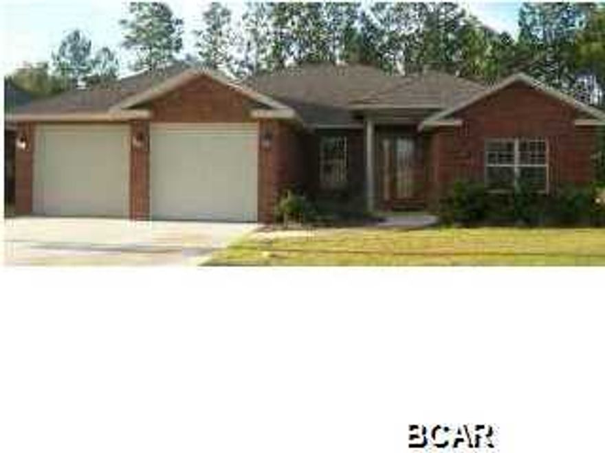 Amazing 4 bedroom 3 bath home in Camryn's Crossing! Close to Lynn Haven schools. Walk in the door to an open kitchen/dining/living area with hardwood floors, vaulted ceilings, crown molding, fireplace with a custom mantel and French doors leading to an enclosed patio. Kitchen has granite counter tops, over-sized cabinets with lots of storage space and stainless steel appliances. The master bedroom is spacious by itself but also leads to the master bath which features double marble vanities, whirlpool tub, roomy separate shower and a walk-in closet to please anyone. A split floor plan leads to 3 additional bedrooms and 2 baths. The yard has a sprinkler system and plenty of room for kids to play. Did we mention the 2 car garage that is completely finished and painted? Don't miss out