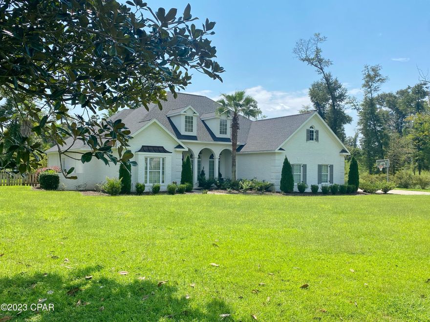 Welcome to your dream home! This stunning custom-built 3-bedroom, 3.5-bath residence is a masterpiece of architectural design and offers an array of premium features that will exceed your expectations. Nestled in a picturesque neighborhood on the 12th hole of Indian Springs Golf Course, this home boasts timeless elegance with a painted brick exterior and impeccable landscaping. Here's your opportunity to experience luxury living at its finest.
As you step inside, you'll be greeted by a grand coffered ceiling living room with a cozy fireplace, setting the tone for elegance and warmth. The open floor plan seamlessly connects the living room to the gourmet kitchen, making it perfect for entertaining guests or family gatherings. The kitchen features top-of-the-line appliances, granite countertops, and an island with bar seating. An additional 8 x 6 ft pantry provides ample storage. 

For those looking for additional entertainment options, the home offers an extra bonus living area with a wet bar, ideal for hosting game nights or watching your favorite sports events. Adjacent to this space, you'll find a fitness room, ensuring you can maintain a healthy lifestyle without ever leaving the comfort of your home.

Step outside to your private backyard oasis, where you'll discover an inground saltwater gunite pool with a spa. Whether you want to take a refreshing dip on a hot summer day or unwind in the spa under the stars, this outdoor space has it all. The covered outdoor kitchen with a fireplace allows for year-round alfresco dining and entertaining, making it the perfect spot to enjoy the great outdoors without sacrificing comfort.

The backyard is an absolute masterpiece, meticulously landscaped with lush greenery and vibrant flowers. A fenced perimeter ensures privacy, creating a serene sanctuary for relaxation and outdoor activities.

Don't miss your chance to own this exceptional custom home that combines timeless beauty, modern amenities, and outdoor luxury. Schedule a private viewing today and experience the epitome of elegant living!