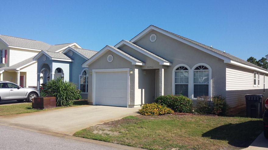 NEW CARPET 6/2017! Low maintenance home in a centrally located, gated community. HOA covers so much for such a small fee. Beach, shopping and restaurants close by. This well designed home has comfortably sized rooms and plenty of storage. There is a pantry just off the large open kitchen with breakfast bar and dining area. The laundry room has a 2nd large pantry/storage area behind doors and room to hang clothes. Generous master suite has a walk in closet. Split floor plan so your guests will have privacy too. Sit on the back porch and enjoy your view of the pond. One car garage and 2 driveway spots for parking. All sizes and dimensions are approx and should be verified if important.