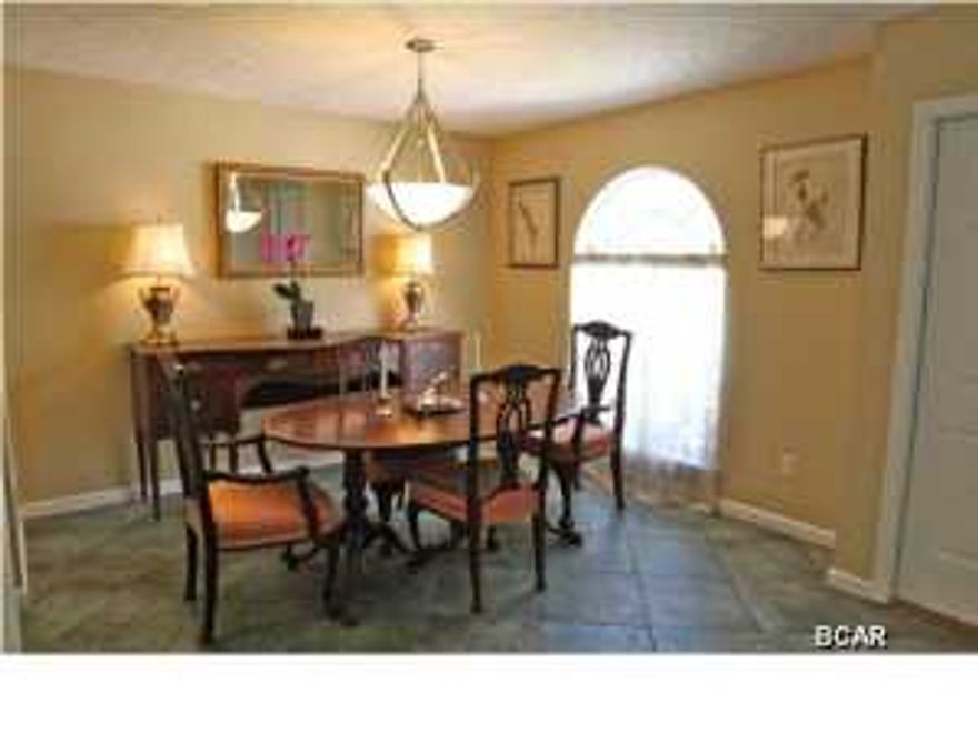 This is a fun cute house with very nice features, including a pool and water garden. The home has a sodded yard with sprinkler system with lawn well + pump. Inside you will find granite counter tops, a glass back-splash, and imported Italian porcelain tile floors. It also has a gas fireplace and comes with a grill connected to gas line. The back features an in-ground saltwater pool complete with beach entrance, waterfall, and build in bench. The pool is also rimmed in custom hand made glass tiles. The back porch is the full width of the house and has upgraded light fixtures. The front yard features a small water garden.