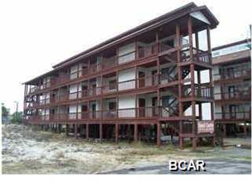 This is a studio unit located on the Gulf side of the building on the 2nd floor above the parking area. This complex has a pool and pool house with bathrooms. This was part of an estate. Living room/kitchen/dining combination. The unit is sold furnished as is. Storage room outside the front door has a washer and dryer.