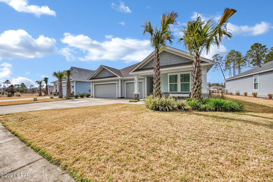 Like New Home with pool and all the upgrades -located in Panama City Beach's desired Breakfast Point subdivision built by Southern Coastal Homes in 2018 -Offering quick easy access to the white sandy beaches of the Gulf of Mexico, Breakfast Point shopping center, and the famous Pier Park. INTERIOR features of this coastal inspired home offers a private grand Foyer entrance, large volume Great Room with an open floor plan, kitchen with center island, custom cabinetry with soft close drawers and stainless steel appliances, Master Suite with tray ceiling, expansive tiled shower, double vanity and large walk-in closet. Three more guest Bedrooms with access to full baths plus a side door entrance to a separate living area with Full Kitchen, Bedroom and Bath. EXTERIOR: This Modified Heron floorplan home features a 1 car garage plus Golf Cart area, covered lanai, covered front porch, fully sodded yard with Rain Bird sprinkler system. This home is a DIAMOND PACKAGE with upgraded finishes including plank flooring throughout including all the bedrooms, marble-look quartz solid surface counter tops, porcelain apron sink, tile Kitchen back splash, Whirlpool "Gourmet Kitchen" appliances, magic stairs and private pool.