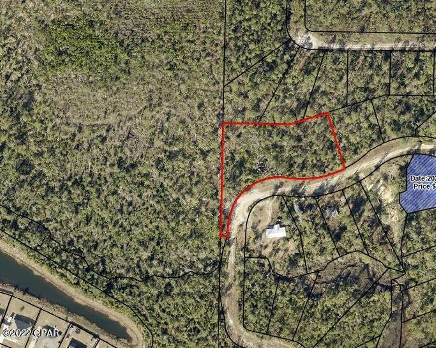 Hickory Bluff, named for the trees and high and dry land, here is a building lot, ready for a new construction or mobile home. Surrounded by new homes and a short distance to Fanning Bayou, fishing, boat ramp and just a few miles from Lynn Haven. The lot has with no association fees so bring your boat, RV, build a pole bar or workshop. Peaceful, quiet and ready to go today! Lot next door is for sale as well or choose from any of the 50 lots we have for sale in Hickory Bluff community! Call for additional details.