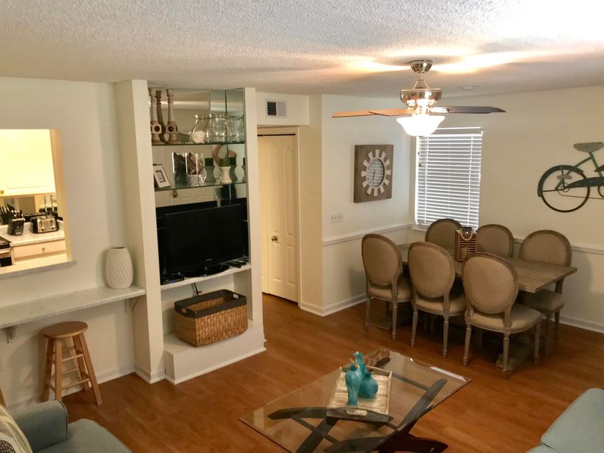 This beautifully appointed and renovated, FIRST floor unit might be the best beach bargain out there!  This unit features 1 Bedroom + Bunks and 1 1/2 Baths.  It comes fully furnished in a gated community with many amenities - 4 pools, tennis, a fitness center, deeded beach access, just to name a few.  Not to mention a FULL Fall calendar of upcoming rentals!  Don't miss out on this outstanding investment!  Schedule your showing today!