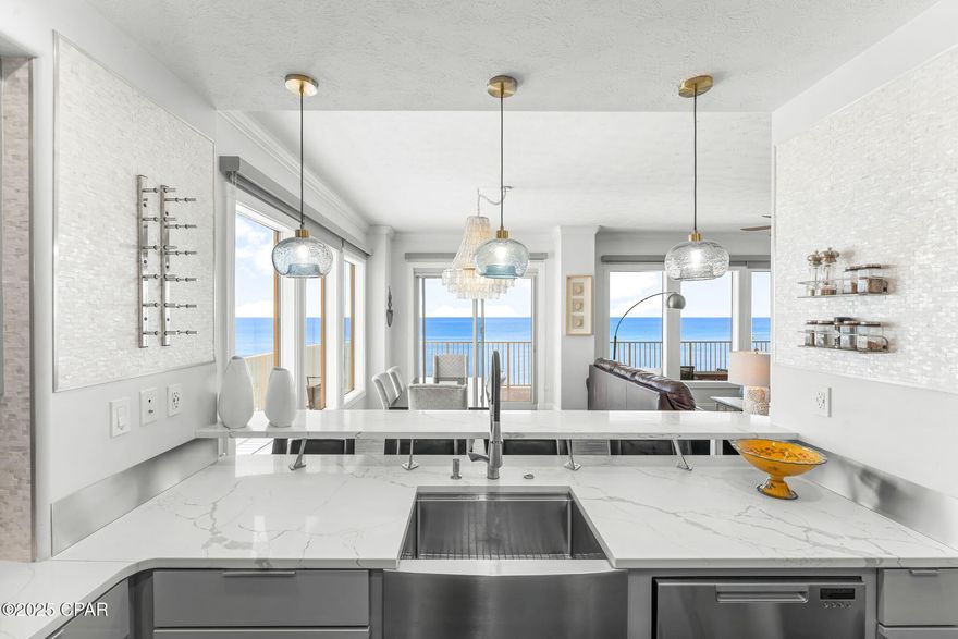 Experience Unrivaled Luxury at This Gulf-Front Oasis

Welcome to your dream coastal retreat, a fully renovated three-bedroom, two-bathroom condominium situated at the perfect level on the 4th floor, offering some of the most breathtaking views in Panama City Beach. This stunning property combines the tranquility of beachfront vacationing with sophisticated, high-end design elements and impressive amenities.
Key Features:
Panoramic Gulf Views: Floor-to-ceiling windows in all main living areas maximize natural light and capture sweeping, unobstructed views of the Gulf's emerald waters and the vast Panama City Beach coastline. Watch the sun sink into the horizon on the massive wrap around balcony.
Gourmet Kitchen: The chef's kitchen is a masterpiece of design, featuring custom Scandinavian cabinetry, quartz counter tops, top-of-the-line appliances, Fisher & Paykel dishwasher drawer and a sleek induction cooktop. It is an entertainer's delight where you can prepare meals while enjoying the captivating seascape and interacting with guests and family.
Spa-Inspired Bathrooms: Both bathrooms have been meticulously updated to the highest standards, offering a luxurious, spa-like experience. The primary ensuite bathroom features a custom-tiled walk-in shower with multiple shower heads, body spray and custom double vanity with separate water closet. The main bathroom is equally luxurious with glass enclosed tub/shower combo and custom tile work. Both bathrooms have all new fixtures and Toto toilets.
Wrap-Around Balcony: Step outside onto the expansive 800sqft, wrap-around balcony, an outdoor sanctuary perfect for morning coffee, sunset cocktails, or simply relaxing to the sound of the waves.
Convenience: A dedicated, full laundry room adds ease and functionality to your stay.

Other notable features, improvements and upgrades include: The interior of the unit features 10 foot ceilings that are only available on floors 1 through 5, custom crown molding, all matching quartz countertops , premium induction cook top, two microwave/convection oven combos, high grade wood-grain vinyl/composite plank flooring, custom walk-in, double shower head and body spray shower in primary bathroom, nest controlled heating and air, nest front door security camera, new Minka ceiling fans, high-end gloss cabinets in kitchen and internal drawer pull-outs, built-in whole house water filter (self-cleans) for entire condo, custom HVAC vent registers, new light switches and electric outlets and many other upgrades. 

Whether you're seeking a serene permanent residence, a luxurious vacation home, or an exceptional investment property, this condo offers a rare opportunity to own a slice of paradise where every detail has been thoughtfully curated for a life of comfort and elegance. Treasure Island Resort enjoys some of the lowest HOA fees on the beach. This Treasure Island unit is truly a masterpiece residence that must be seen to be fully appreciated. Schedule your private viewing today.