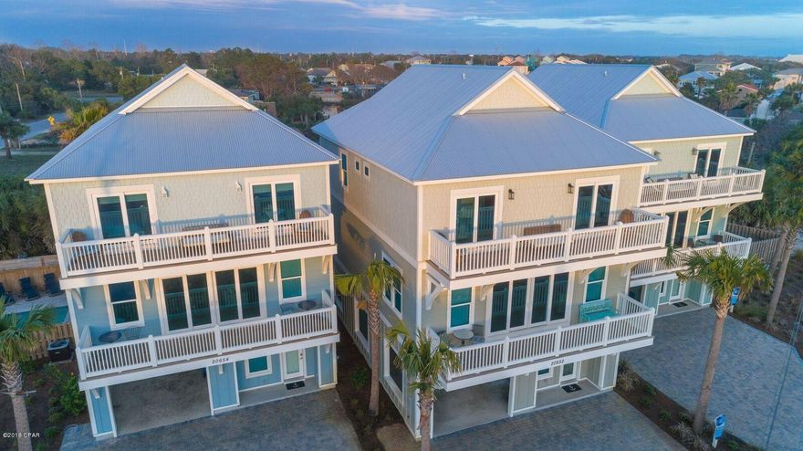 Owner just dropped the listing price by 100,000.00 and said it's time to go.  Investor/developer owned, New beach house with great gulf views.  dedicated beach and beach access right across the street.  Rental machine that sleeps 20 and comes completely furnished ready to rent.  Unit has private pool, outdoor kitchen and plenty of decks and outdoor entertainment area.  Coastal chame Designes is the Decorator. Great established income and preapproved with several banks for commercial financing or residential financing.
