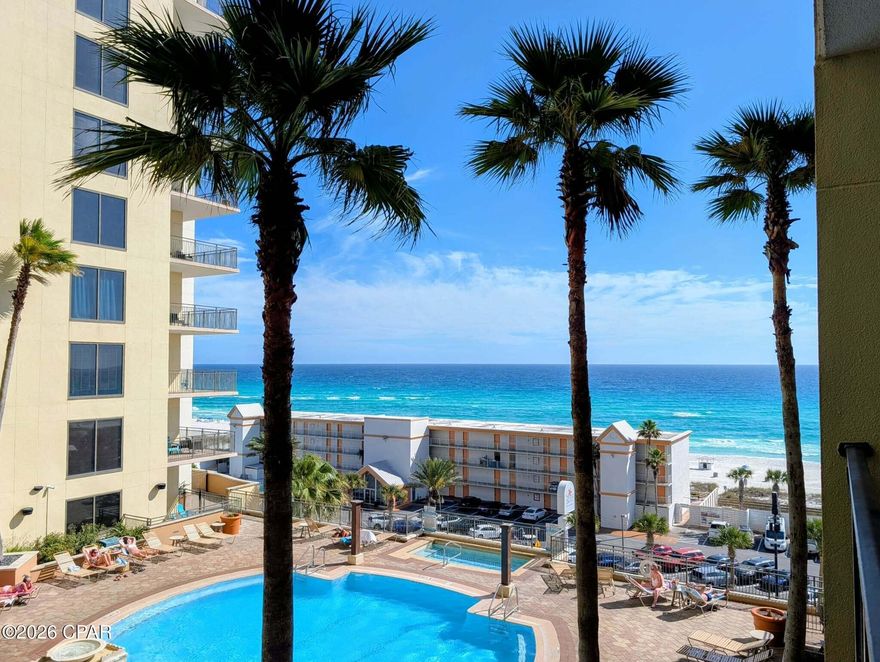 Are you ready to own an amazing condo in an amazing resort with Gulf and pool views?  Whether you are looking for a place to call home, or a great investment property that you can still use as your personal vacation retreat, Origin 608 has you covered.  This stunning 1 bed 1 bath condo has all the room you need with a total of 815 square feet and sleeping for 4!  The large kitchen has new appliances, and tile floors.  No carpet in the entire condo!  The bathroom is tile, while the living area and bedroom feature LVP flooring throughout!  The bath is accessible from the living area for guests, as well as, through the bedroom, and features a tub/shower combo for all your needs.  In the bedroom you'll find a king size bed, large closet, and views of the pool deck and Gulf of America.  The large living area provides a sleeper sofa with additional seating, and an open concept dining area with seating for 4.  Through the large glass balcony doors are views of the amenities deck, pool, hot tub, and Gulf.  The balcony also offers plenty of space for everyone while enjoying the views.  The amenities deck at Origin is on the 4th floor, making the balcony of 608 only 2 floors high!  The hot water heater, kitchen appliances, and washer and dryer have all been recently replaced, providing a worry-free ownership experience.  Origin is one of the very few high-rise condos in PCB to offer interior corridors, keeping you safe and dry during inclement weather.  Origin offers many amenities including two BBQ grill/picnic areas, a heated pool, hot tub, theater, game room, laundry facility, vending, a gated community with 24-hour security, Beaches and Cream convenient store and grill, and Sunsations beach store.  Call today for a private showing!