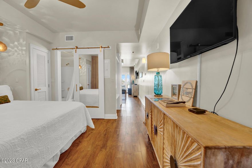 Located in a beautiful private luxury community, this unit has the atmosphere of pure paradise. Newly renovated with the feel of coastal luxury. From the LVP flooring to the updated bathroom with its beautiful barn door. This condo is low maintenance. This property is located just 2 minuets from the world-renowned vacation spot known as 30A, where you will find many activities and fine dining restaurants. Also, Pier Park is just minutes away for some great shopping. This unit is an income producing machine with guest from all over the world wanting to visit. This unit produces excellent rental income. From basketball courts to tennis courts to multiple pools to choose from, these amenities are top notch! This unit sleeps up to 4 people. This is a must-see condo unit, so don't miss out!