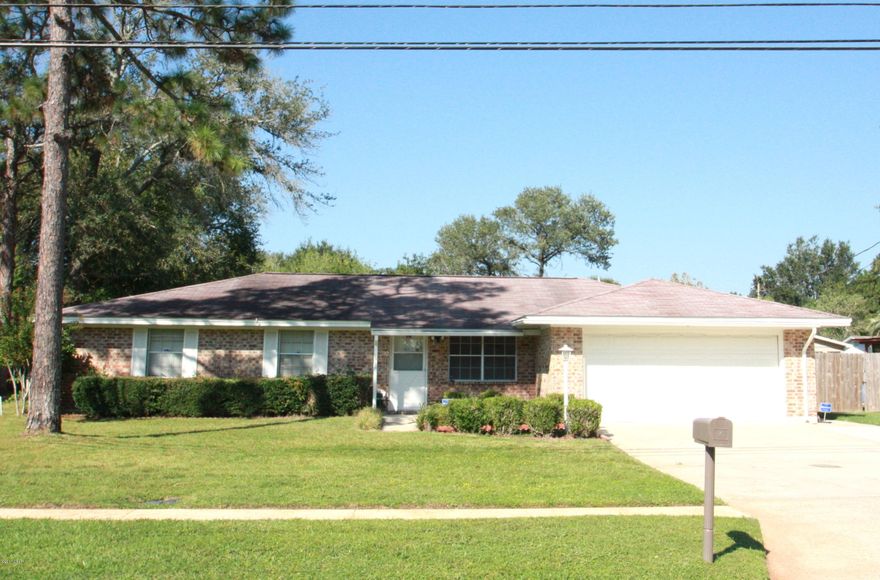 Nice home in appealing neighborhood, convenient to Tyndall AFB & downtown. New carpeting & paint throughout; roof age 2005 according to tax appraiser. Plenty of space to spread out in: spacious Family Room (26x14)  convenient to Kitchen, Rec Room & Covered Patio; fully equipped Kitchen’s breakfast bar opens into Family Room–frig, range, dishwasher & pantry; Rec Room (23x12) opens onto Covered Patio; Covered Patio (17x9) provides a terrific outdoor living space; spacious Master Suite (16x12) with large closet & en suite bathroom; 2 additional bedrooms provide plenty of space for children or guests, together with a 2nd bathroom. Backyard privacy fence; double garage; oversize driveway; appealing landscaping. VA/FHA/USDA financing available to qualified buyers. 1 year home warranty.
