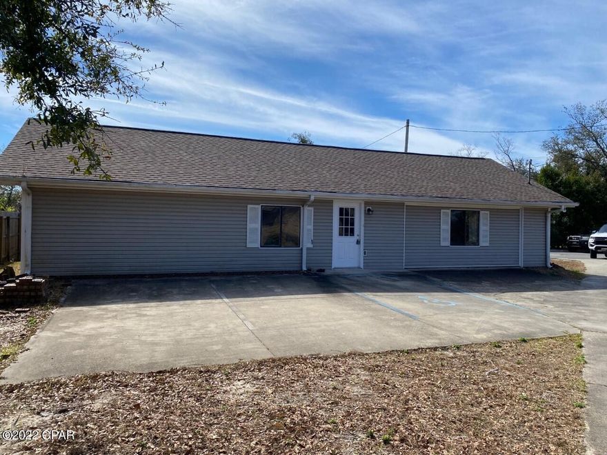 Fantastic location for this centrally located 2 bedroom 1.5 bath home in Panama City.  Just one City block from 23rd Street and Gulf Coast Hospital (Gulf Coast Regional Medical Center).  This home features 2 large bedrooms, dining room, large living room with vaulted ceilings and well equipped kitchen, and over sized laundry room with a half bath.