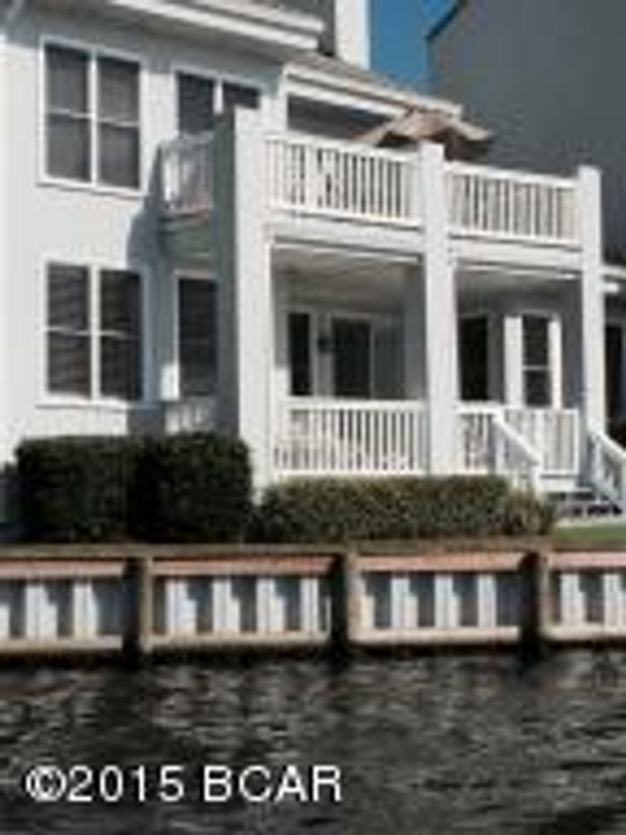 Exquisite Waterfront Marina Club. A combination of elegance and sophistication defines this renovated ground floor condominium. As you enter the foyer,incredible decor can be observed. Boasting 3 bedrooms (one converted from garage) 2 baths, completely renovated kitchen with granite counter tops, stainless sub zero refrigerator, thermador stainless appliances, inlaid tile backdrop and new custom cabinets. A breakfast area, separate dining & living room with fireplace. Over the top renovations includes such items as marble floors, plantation shutters, new light fixtures, electric switches, faucets & front-load washer and dryer. Other features include beautiful furnishings, two flat screen TV's, ceiling fans, and carpet. Owner spent over $100,000.SQ. APPROX.