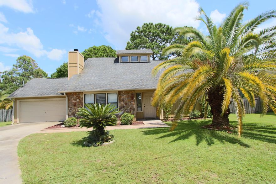This Premier Estates home was built by Koehnemann Construction. The floor plan is airy and flows nicely. When entering the home the sidelights and skylights provide lots of natural lighting. The 19' high vaulted ceiling in the great room along with the wood burning fireplace really make it feel spacious and comfy. There is a Florida Room with wet bar and tile flooring that is large enough for entertaining. The Florida room includes ceiling fans, windows/screens and a separate heat/AC unit. The master bedroom is located on the ground floor and includes a huge walk in closet. The master bath has a separate vanity/dressing area.  Both guest bedrooms are located on the 2nd floor and include HUGE step in closets for plenty of storage. Wait!  Click ''more'' for more info!!! Home is centrally located to shopping and hospitals and Lynn Haven. NO Association Fees!!Don't pass this one by. Make your appointment to see this one today. * All measurements, Age and square footage are approximate if important please measure. Home is centrally located to shopping and hospitals and Lynn Haven. NO Association Fees!!!