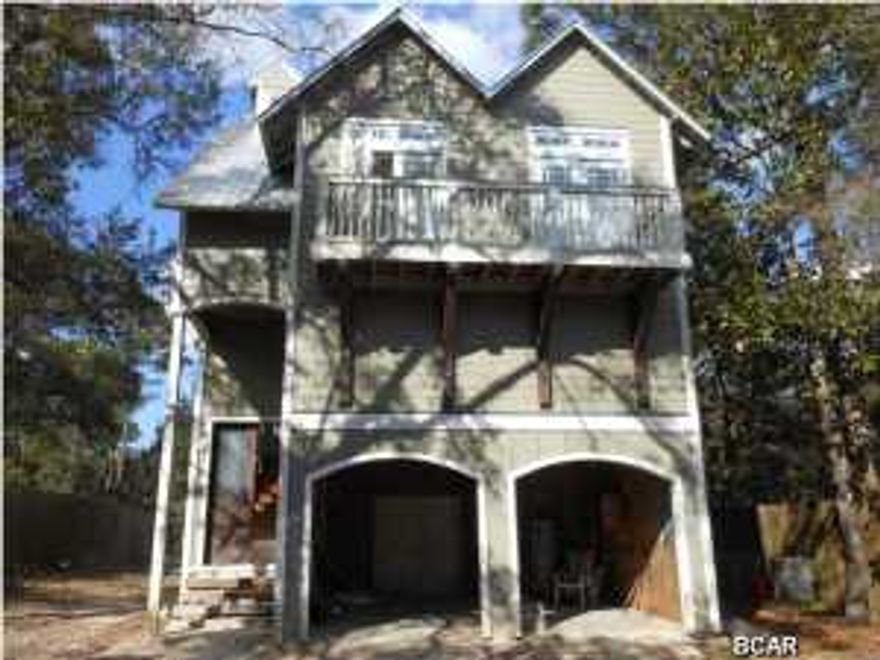 * BANK OWNED * THIS IS THE DEAL IF THE YEAR. HOUSE IS 80% COMPLETE. WALK THROUGH REAR YARD TO THE INTERCOASTAL WATER WAY. 4469 SF UNDER ROOF. FINISHED VALUE WOULD BE TWICE THIS PRICE. * CASH CONTRACTS ONLY * NO FINANCING AVAILABLE IN CURRENT CONDITION, SOLD AS IS, BANK DOES NO REPAIRS. only 10 mins from the Beaches and Pier Park. This home with wide expansive porches offers water views and plenty of space. There is still some TLC needed to finish some rooms but don't let that stop from seeing this great home. Air-conditioning equipment consists of 16 sear American Standard high-efficiency systems. Wall insulation is R 30 and in the attic it's an open cell spray foam insulation. BUYER PAYS DOC AND TITLE.