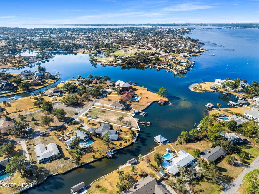Rare Opportunity for Half Acre Vacant Deep Water lot in the highly desirable Kings Point. Discover a rare opportunity to own a vacant waterfront lot in the highly sought-after Kings Point neighborhood! This over half-acre property boasts of over 110 feet of seawall and deep water access, making it perfect for boating enthusiasts. It features a brand-new 12x30 boat slip and dock, ready for you to enjoy life on the water. Water and sewer are available, simplifying the building process for your dream home. Don't miss this chance, truly rare find in Kings Point!