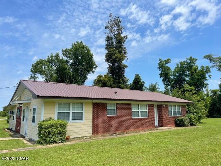 UNDER CONTRACT SELLER ACCEPTING BACKUP OFFERS One level, move in ready and cozy country living make this home everything you've been looking for. Situated on an acre, just outside of Altha, this property is close to several public boat ramps allowing access for fishing or tubing. The workshop out back has the perfect lean-to attached to store your boat or other water toys.  Inside you'll find the well done addition is the perfect space for a craft room, man cave or playroom, still allowing for a separate living area at the front of the house. Schedule today to take a look at this well cared for, well loved home.